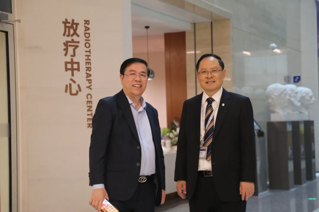 Dr. Qian Chaonan, President of GCCC, and Dr. Eav Sokha in front of the Radiotherapy Center